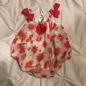 Cute 3 month flower jumper.